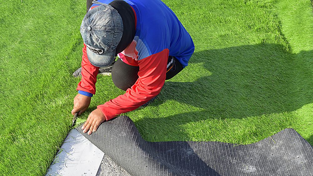 Synthetic turf installation with a close-up view of artificial grass